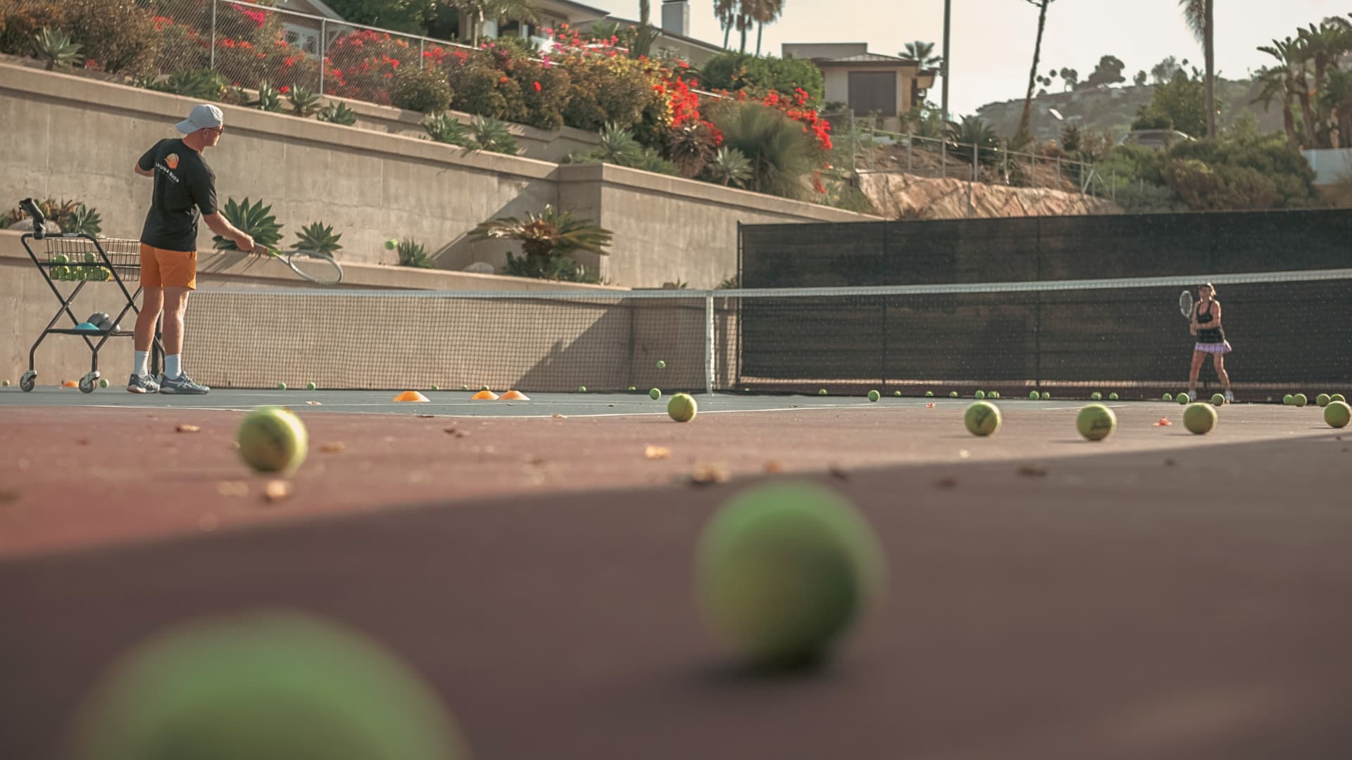 On-court coaching and drills at Laguna Beach Tennis Academy