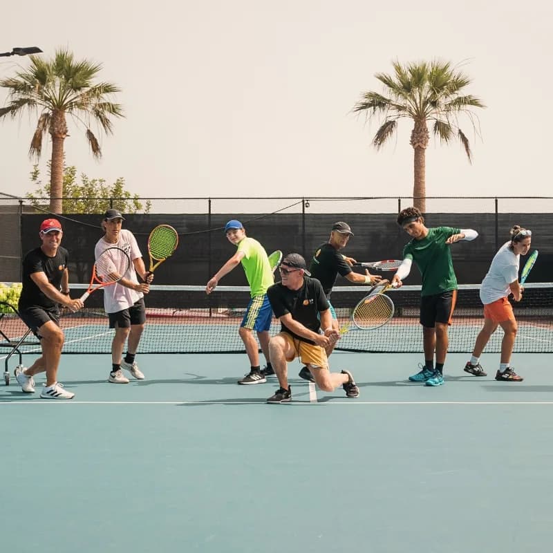 Adult players in formation during a Cardio Tennis session at LBTA